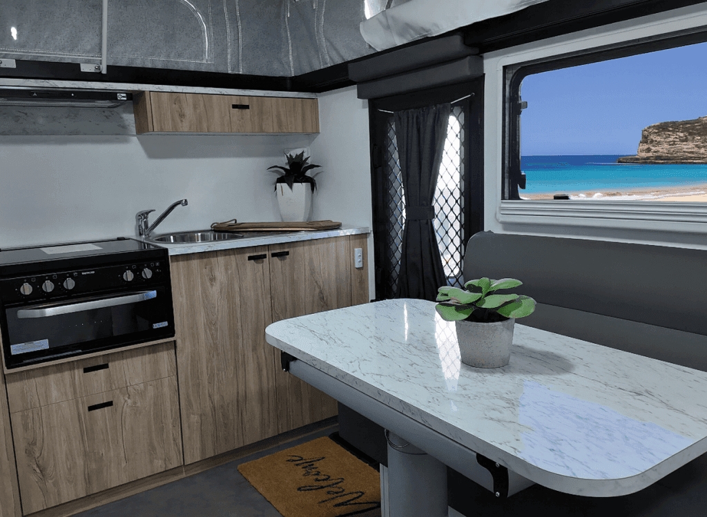 Kitchen and dinette inside a Goldstream RV 1500 Remote pop-top caravan