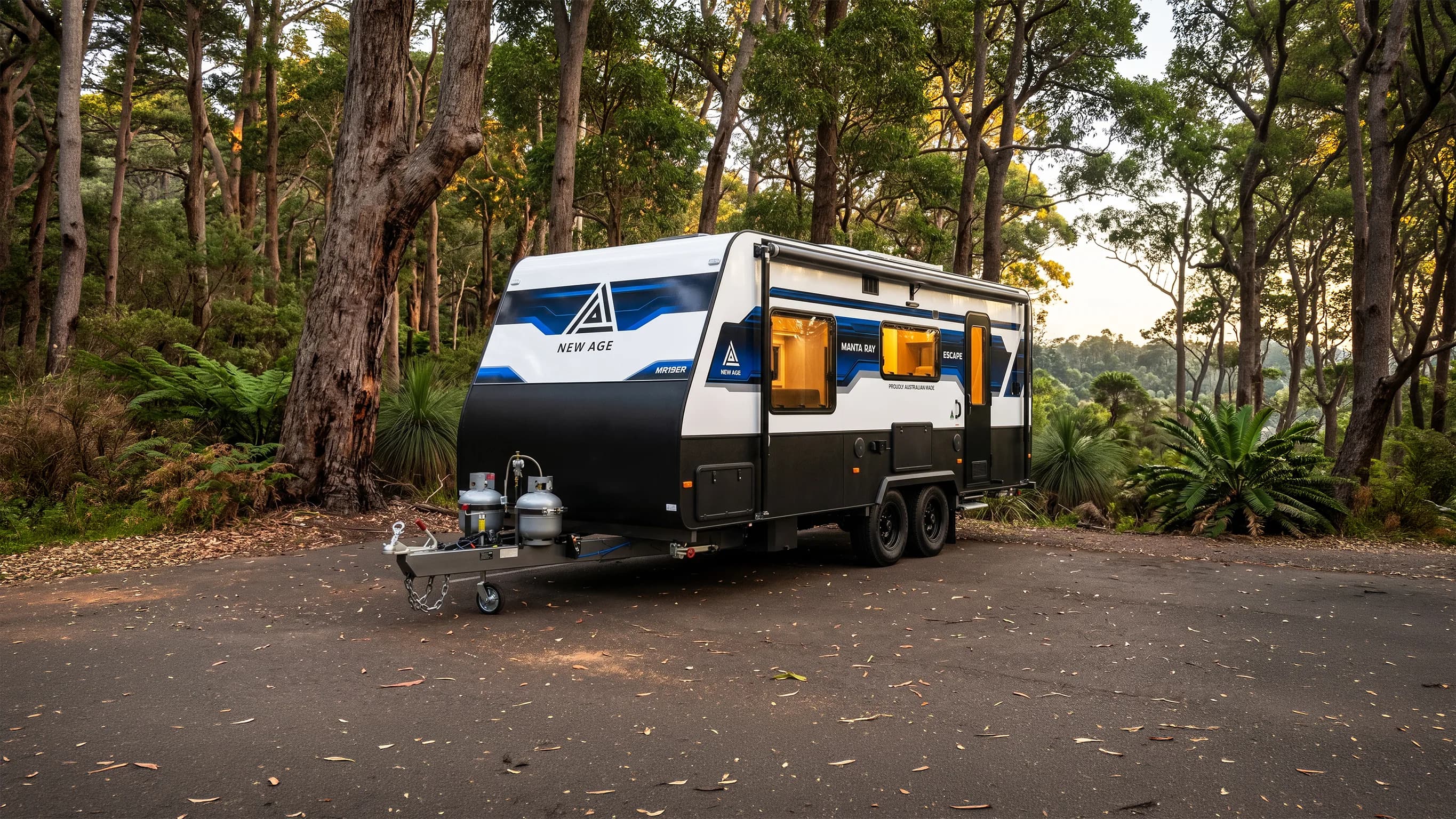 New Age Manta Ray MR19ER caravan photographed among trees